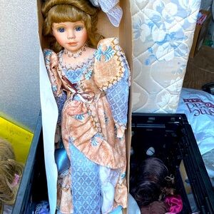 Porcelain doll with stand